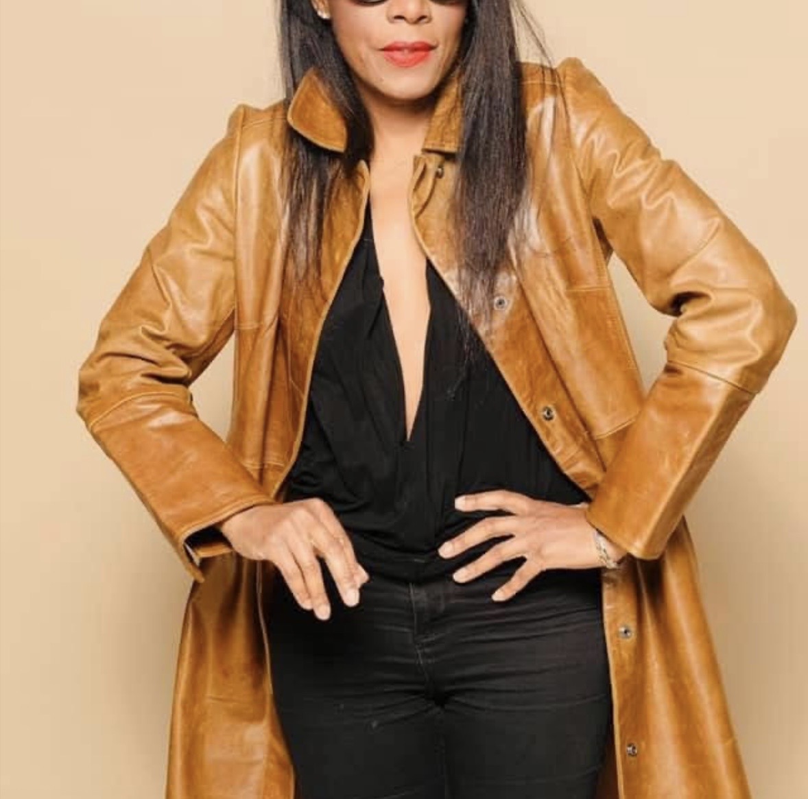 Shauney Recke in a tan leather coat